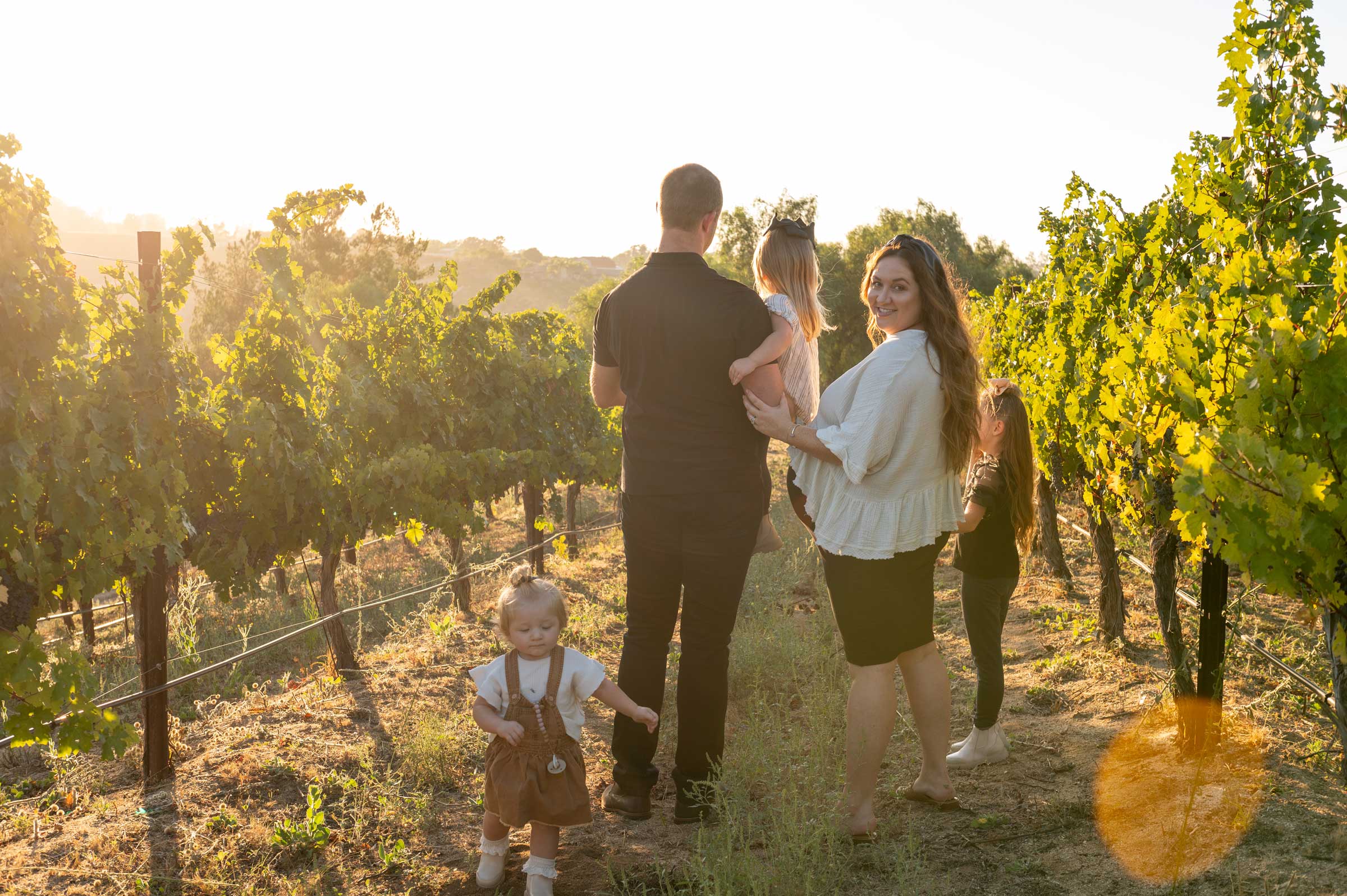Alexa Navarro in the vineyard with her family