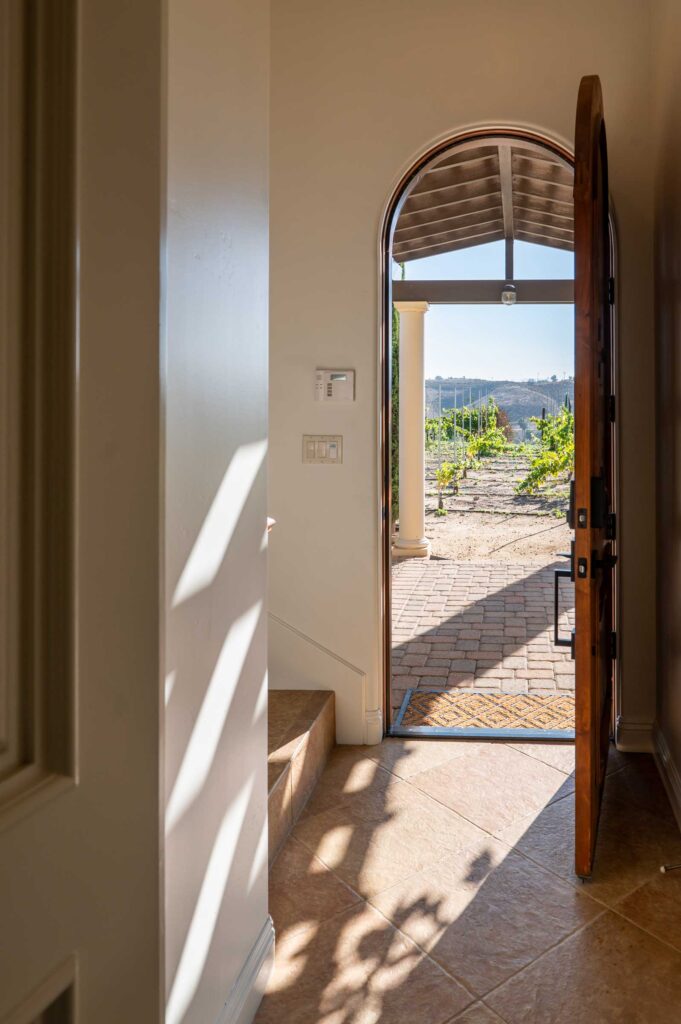 inside the entry of Villa de Portola at Navarro Family Vineyard, looking outside the front door